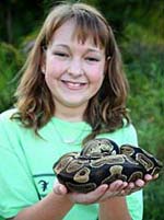girl holding a snake